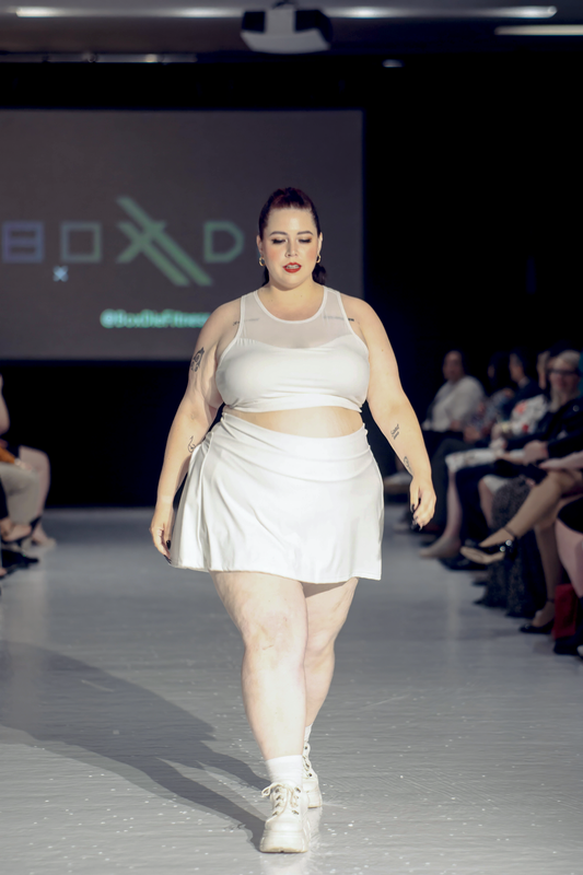 PLEATED BACK WORKOUT SKIRT WITH SHORTS AND POCKETS
